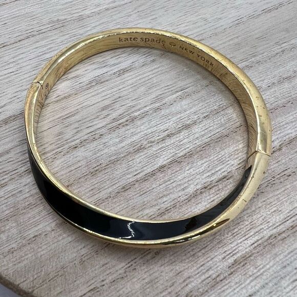 Kate Spade New York Black Enamel and Gold Tone Wave Twist Bangle Bracelet - Picture 4 of 11
